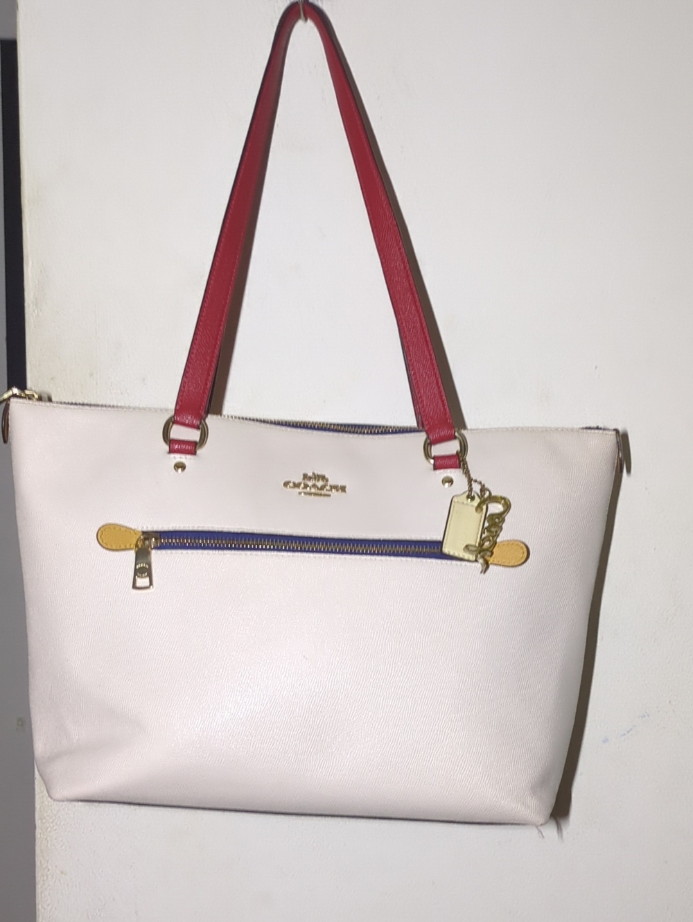 Coach Cream Leather Tote with Red Straps and Blue Trim $110